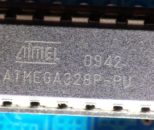 Photo of a ATMEGA328p taken with a Raspberry Pi HQ camera and a microscope