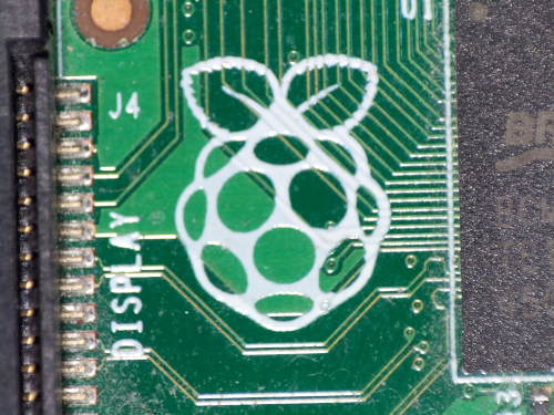 Photo of a Raspberry Pi logo on the Raspberry Pi, taken with a Raspberry Pi HQ camera and a microscope