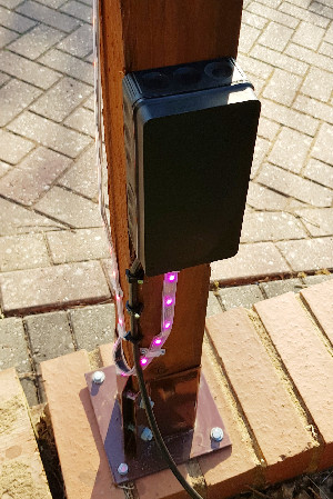 Raspberry Pi controlling NeoPixels mounted outdoors in a waterproof box